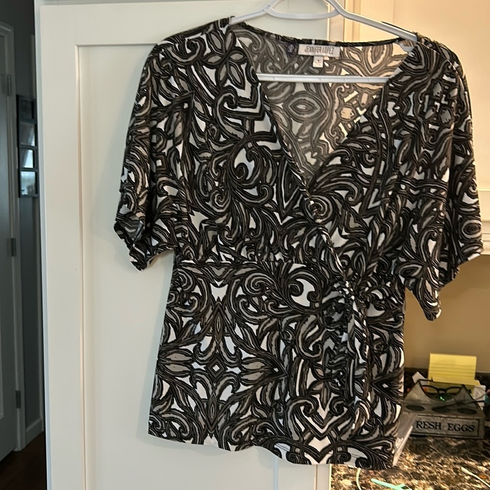 Jennifer Lopez size small top with bow knot on side